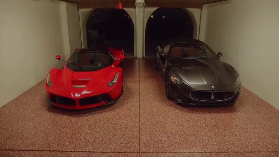 Ferrari and Maserati in a Coachella Valley home garage with a Brilliant flake epoxy floor